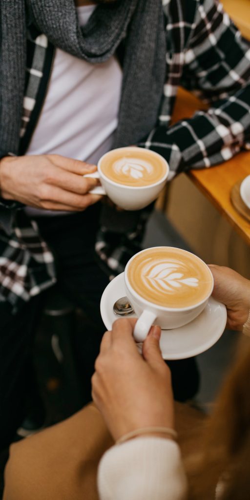 Friends enjoying latte art at The Core Cafe