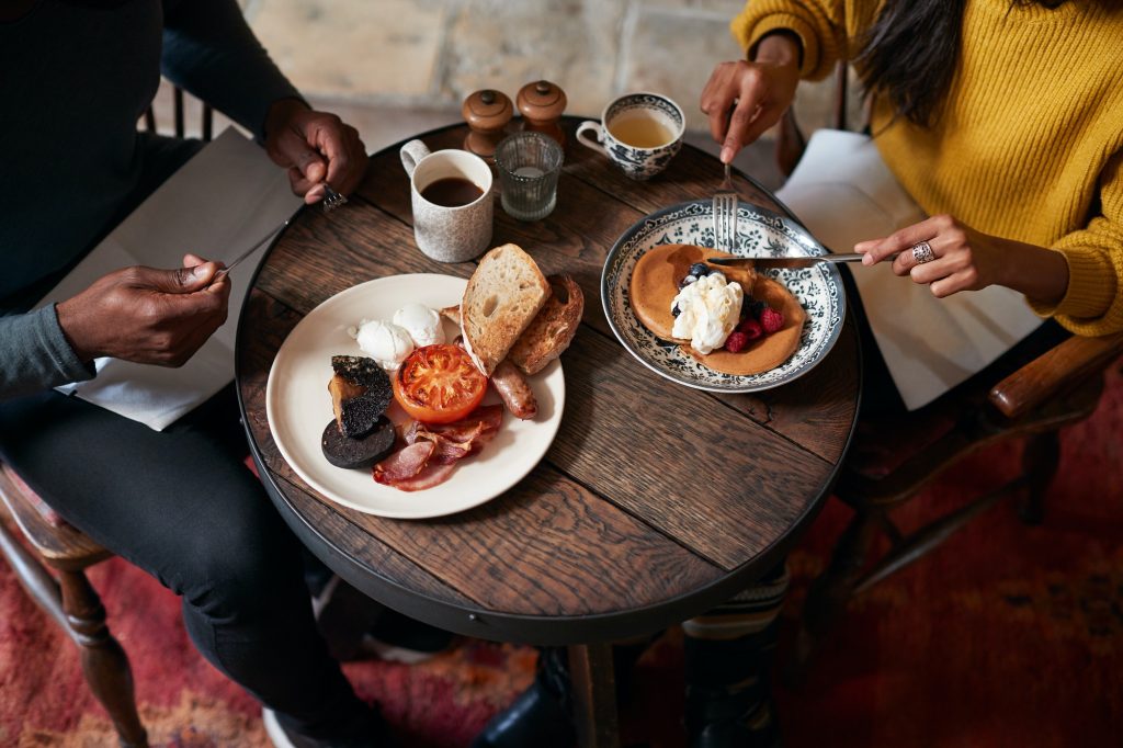 Guests enjoying breakfast together